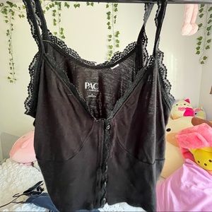 2 black tanks. Used/worn.